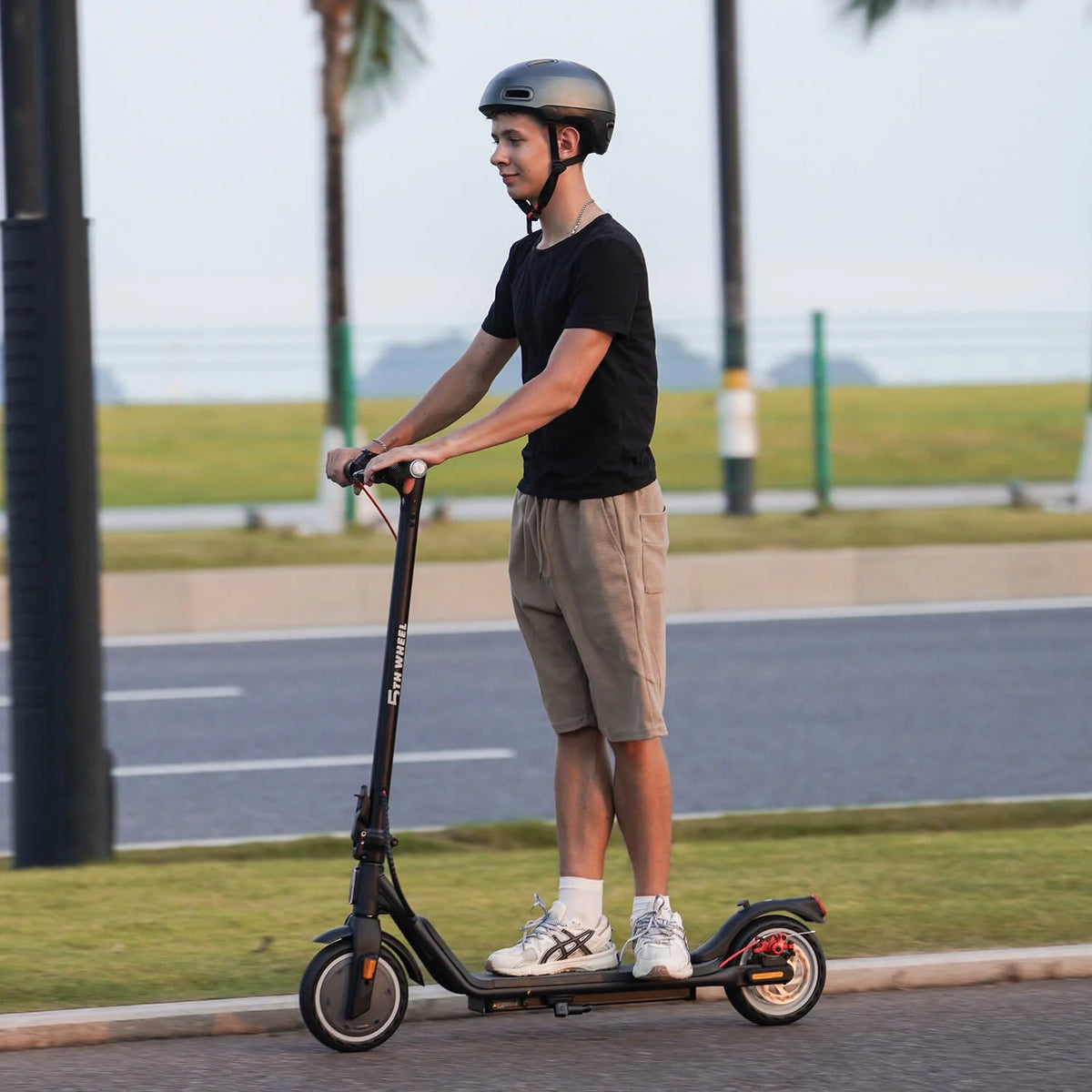 5TH WHEEL W16S 300W Electric Scooter with Turn Signal, 8.5" Solid Tires, 18mph & 12miles Range, Folding Commuting E - Scooter for Adults with APP Control